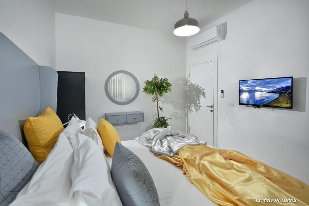 חדר שינה מעוצב במודרניות ואינטימיות - אקווה בוטיק