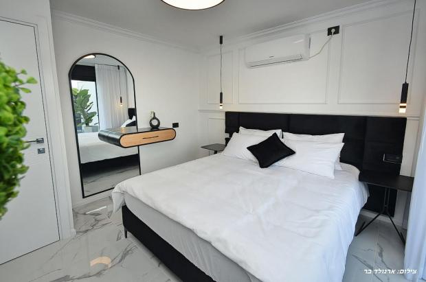 חדר שינה עם מיטה זוגית נוחה במיוחד - פברז’ה- סוויטת יוקרה