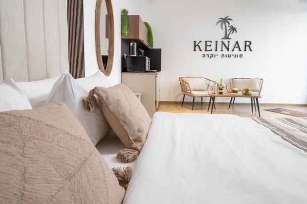 מיטה רחבה ומפנקת בסוויטה - כינר סוויטות יוקרה