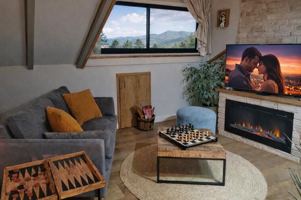 הסלון בסוויטה עם קמין חשמלי - אהבה סוויטה לזוגות